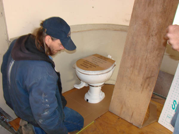 Ren working on the bathroom.