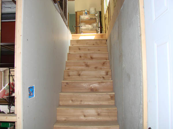 Stairs from garage to house.